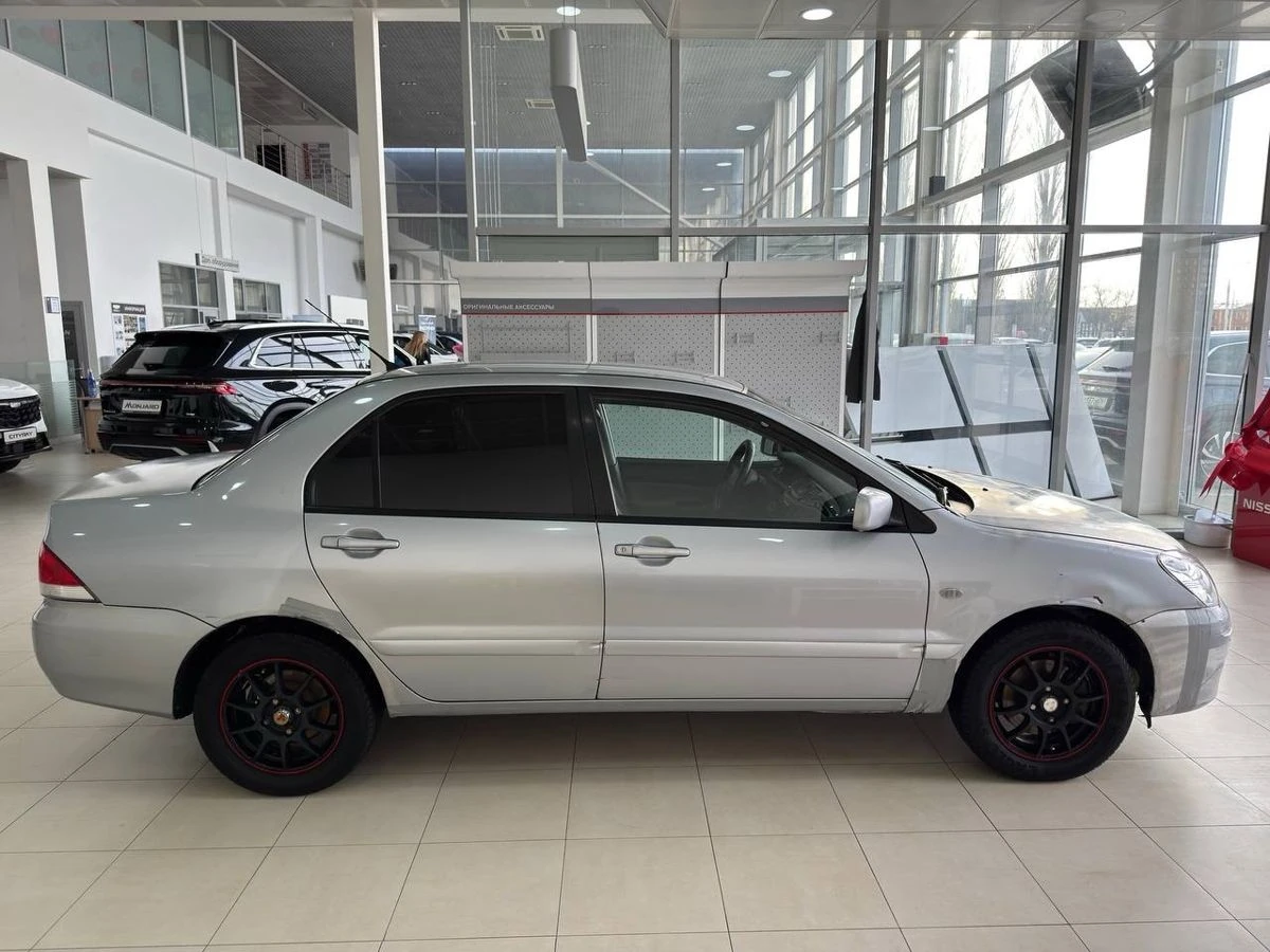 Mitsubishi Lancer, 2005г, передний привод, механика