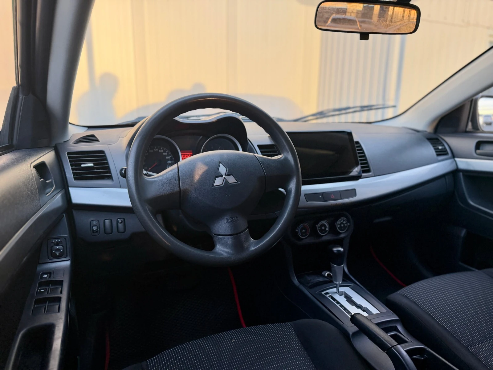 Mitsubishi Lancer, 2010г, передний привод, автомат