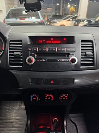 Mitsubishi Lancer, 2009г., передний привод, автомат