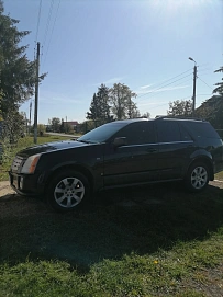 Cadillac SRX, 2008г., задний привод, автомат
