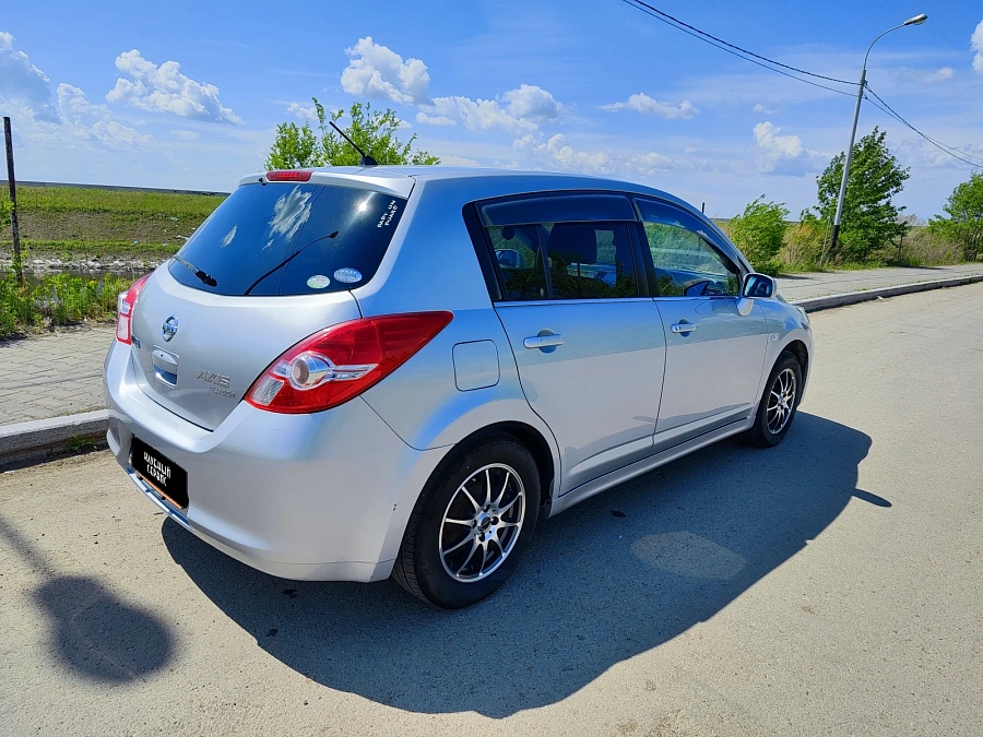 Nissan Tiida, 2010г., передний привод, автомат