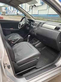 Nissan Tiida, 2010г., передний привод, автомат