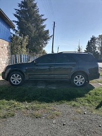 Cadillac SRX, 2008г., задний привод, автомат
