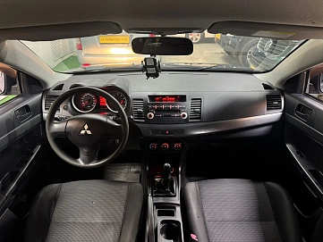Mitsubishi Lancer, 2009г., передний привод, автомат