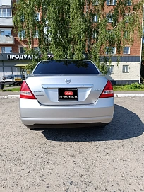 Nissan Tiida, 2005г., полный привод, автомат