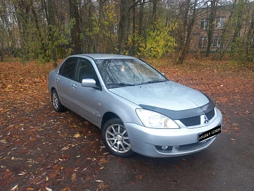 Mitsubishi Lancer, 2009г., передний привод, автомат
