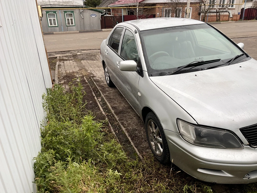 Mitsubishi Lancer, 2002г., передний привод, вариатор