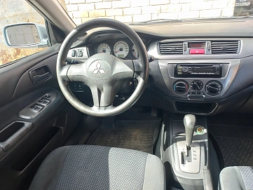Mitsubishi Lancer, 2009г., передний привод, автомат