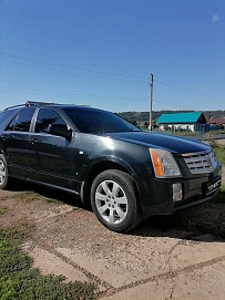 Cadillac SRX, 2008г., задний привод, автомат