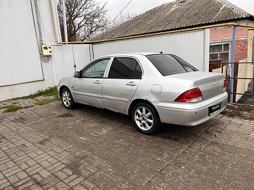 Mitsubishi Lancer, 2002г., передний привод, вариатор