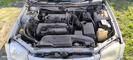 Mazda Familia, 1998г., передний привод, механика
